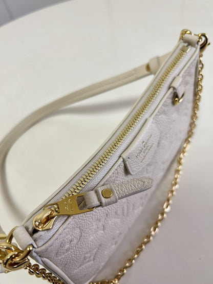 LV Easy Pouch On Strap Monogram Empreinte Crème White For Spring, Women’s Handbags, Shoulder Bags 7.5in/19cm LV M81066