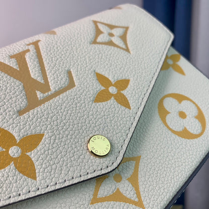 LV Monogram Empreinte Pochette 21cm White