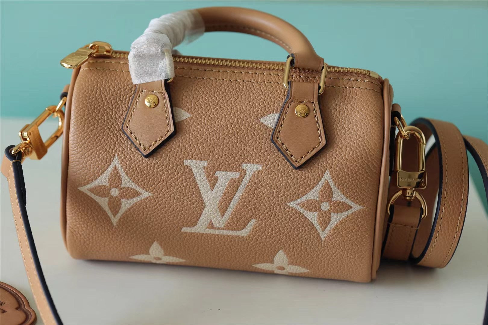 LV Nano Speedy Monogram Empreinte Arizona Beige / Cream For Women,  Shoulder And Crossbody Bags 6.3in/16cm LV M81457