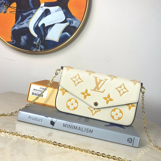 LV Monogram Empreinte Pochette 21cm White