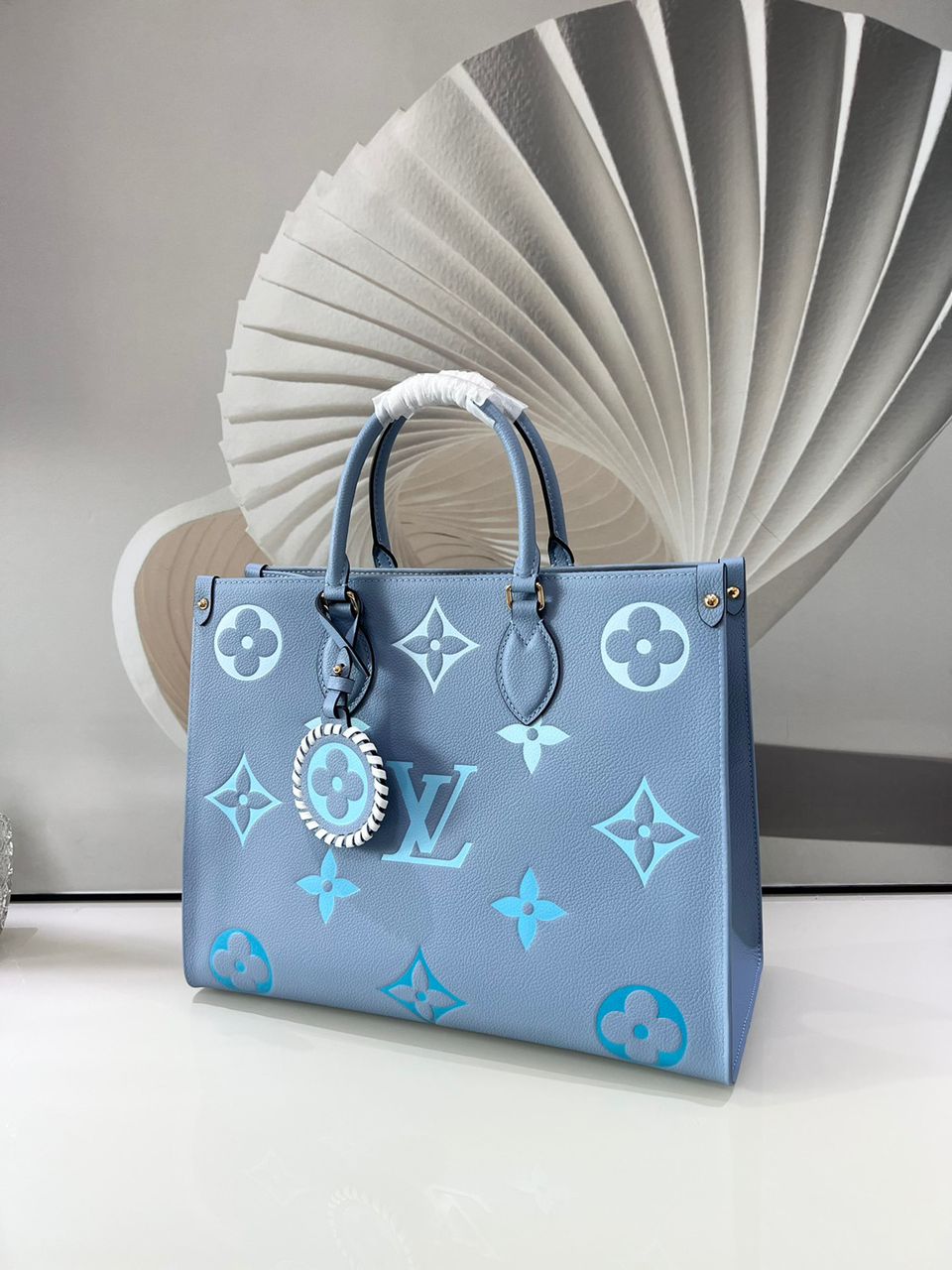 LV OnTheGo MM Monogram Empreinte Summer Blue For By The Pool Collection, Women Handbags, Tote Bags 13.8in/35cm LV M45718