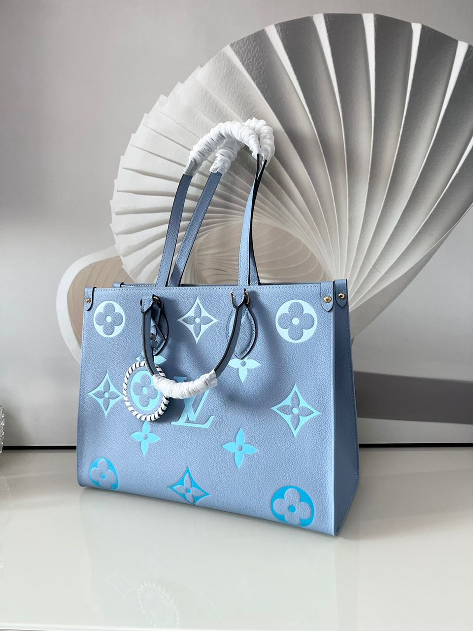 LV OnTheGo MM Monogram Empreinte Summer Blue For By The Pool Collection, Women Handbags, Tote Bags 13.8in/35cm LV M45718