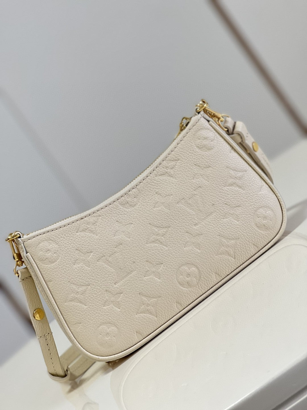 LV Easy Pouch On Strap Monogram Empreinte Crème White For Spring, Women’s Handbags, Shoulder Bags 7.5in/19cm LV M81066