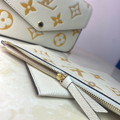 LV Monogram Empreinte Pochette 21cm White